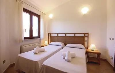 Letto o letti in una camera di Lovely Home In Costa Rei -Ca- With Wifi