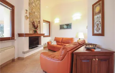 Area soggiorno di Lovely Home In Costa Rei -Ca- With Wifi
