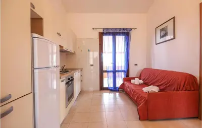 Cucina o angolo cottura di Awesome Apartment In Costa Rei -Ca-