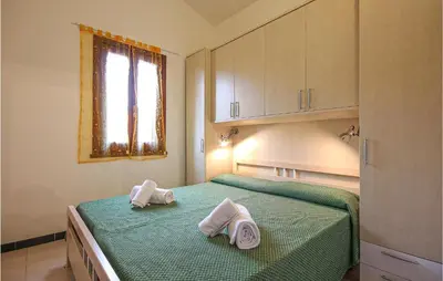 Letto o letti in una camera di Awesome Apartment In Costa Rei -Ca-