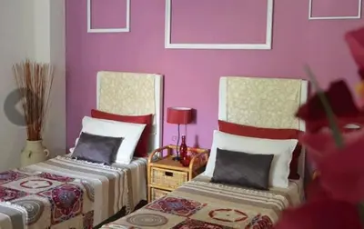 Letto o letti in una camera di Bellini