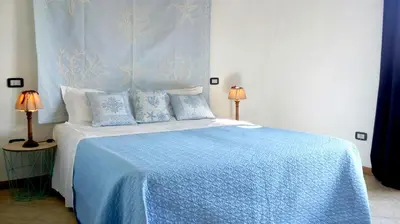 Letto o letti in una camera di Sa Tirìa