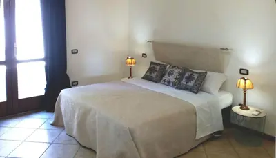 Letto o letti in una camera di Sa Tirìa