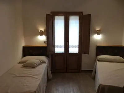 Letto o letti in una camera di Agriturismo S'Orgiola