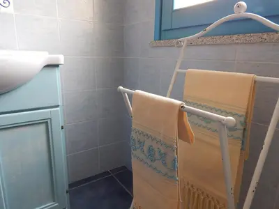 Letto o letti in una camera di S'Apposentu Teuladesu Affittacamere del Ristorante da Stefano