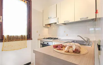 Cucina o angolo cottura di Lovely Apartment In Costa Rei -Ca-
