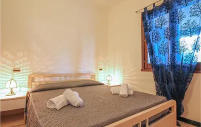 Letto o letti in una camera di Lovely Apartment In Costa Rei -Ca-