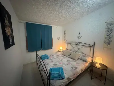 Letto o letti in una camera di Villetta il caminetto