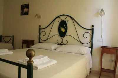 Letto o letti in una camera di Agriturismo Furfullanu