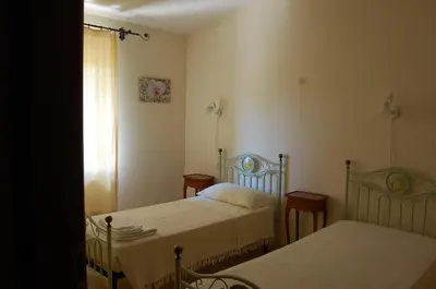 Letto o letti in una camera di Agriturismo Furfullanu