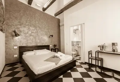 Letto o letti in una camera di Manì Rooms