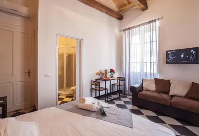 Letto o letti in una camera di Manì Rooms