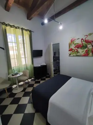 Letto o letti in una camera di Manì Rooms