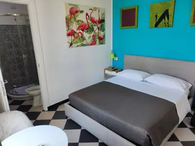 Letto o letti in una camera di Manì Rooms