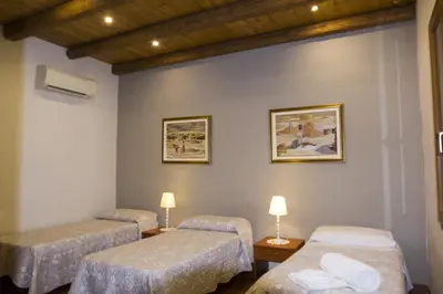 Letto o letti in una camera di House Suestellas