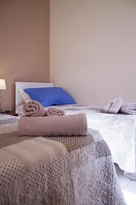 Letto o letti in una camera di Pimpioxelli