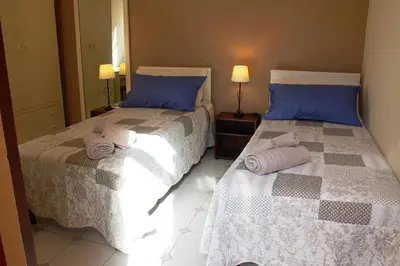 Letto o letti in una camera di Pimpioxelli