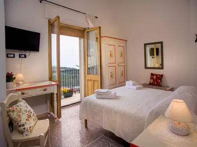 Letto o letti in una camera di B&B Aria Ona