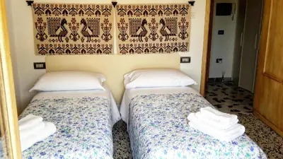 Letto o letti in una camera di B&B Aria Ona