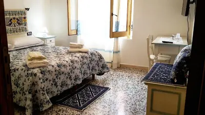 Letto o letti in una camera di B&B Aria Ona