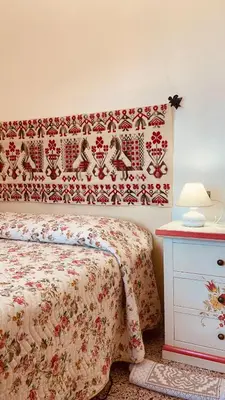 Letto o letti in una camera di B&B Aria Ona