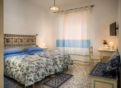 Letto o letti in una camera di B&B Aria Ona