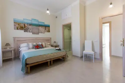 Letto o letti in una camera di Brezza Marina Luxury Rooms