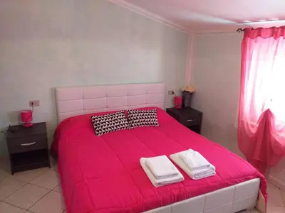 Letto o letti in una camera di B&B Il Girasole