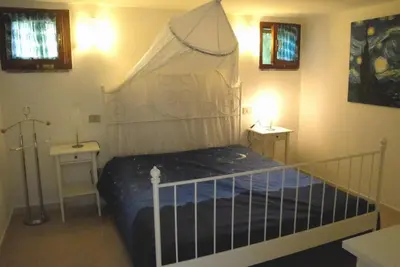 Letto o letti in una camera di Appartamento Paradise