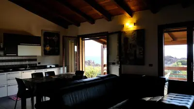 Cucina o angolo cottura di La Baia Casa Vacanze