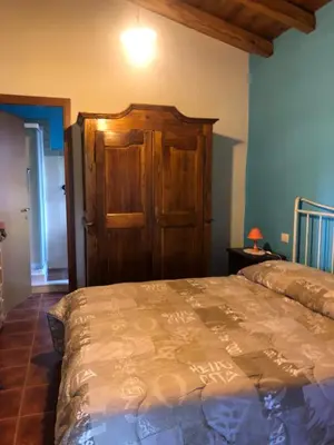Letto o letti in una camera di Agriturismo Bingia Bonaria