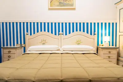 Letto o letti in una camera di Le Tre Stelle