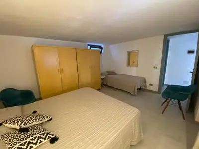 Letto o letti in una camera di Casa Teresa