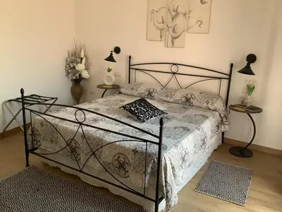 Letto o letti in una camera di Affittacamere BaLu