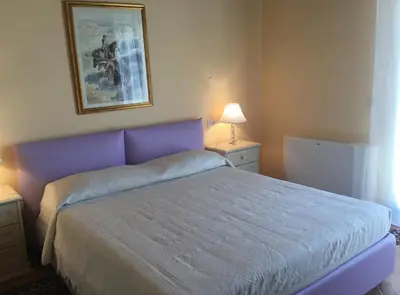 Letto o letti in una camera di Le Tre Civette - Residenza di Campagna