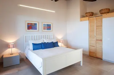 Letto o letti in una camera di Le Tre Civette - Residenza di Campagna