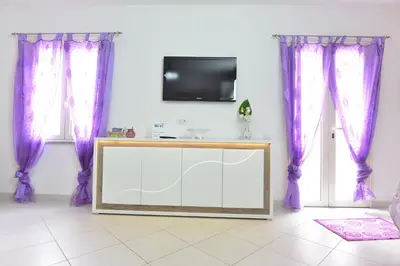 TV o dispositivi per l'intrattenimento presso IzzHome Regina Margherita