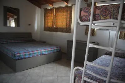 Letto o letti in una camera di Panta House