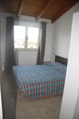 Letto o letti in una camera di Panta House