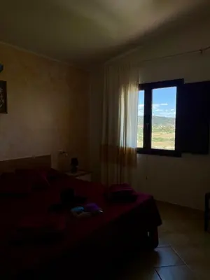 Letto o letti in una camera di Appartamento MareNatura