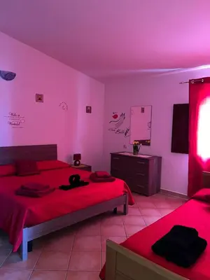 Letto o letti in una camera di Appartamento MareNatura