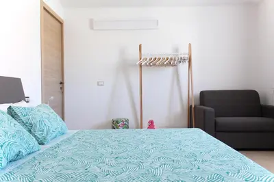 Letto o letti in una camera di Acquachiara