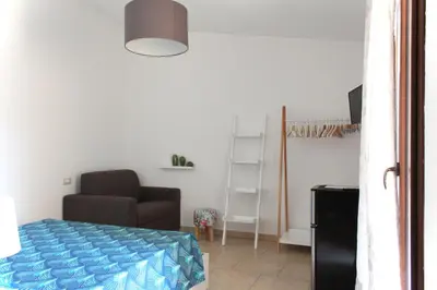 Letto o letti in una camera di Acquachiara