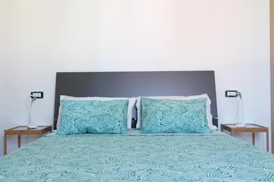 Letto o letti in una camera di Acquachiara