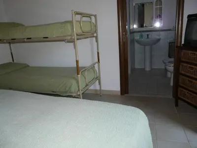 Letto o letti in una camera di B&B Nurachi