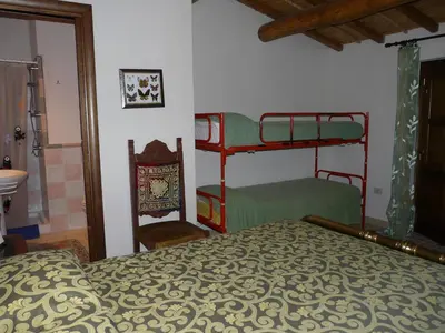 Letto o letti in una camera di B&B Nurachi