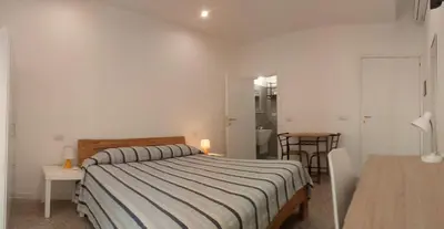 Letto o letti in una camera di Cinghiale Bianco