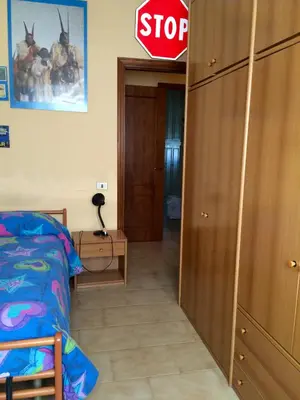 Letto o letti in una camera di Pozzetto & Poetto