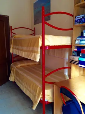 Letto o letti in una camera di Pozzetto & Poetto