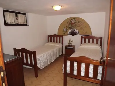 Letto o letti in una camera di Relax a Calasapone